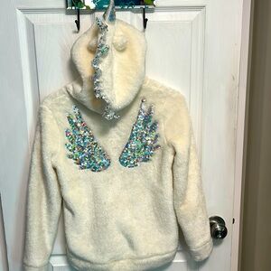 Like new girls zip up with sequin wing embellishments size 10/12!!
